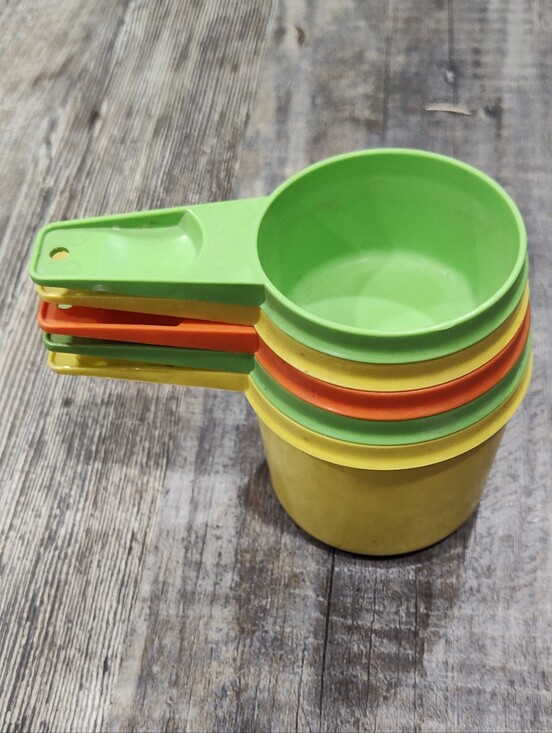Tupperware Other - Tupperware Set Of Five Nesting Measuring Cups, Yellow, Green, Orange